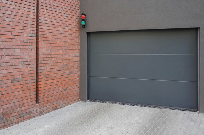 Customer reviewing garage door repair details